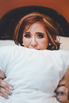 Framay's Boudoir Hiding Behind Cushion